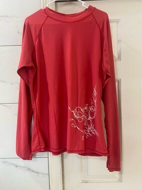 Women’s Long-Sleeve Coral color Performance Top with Floral Accent 2x SPF 50